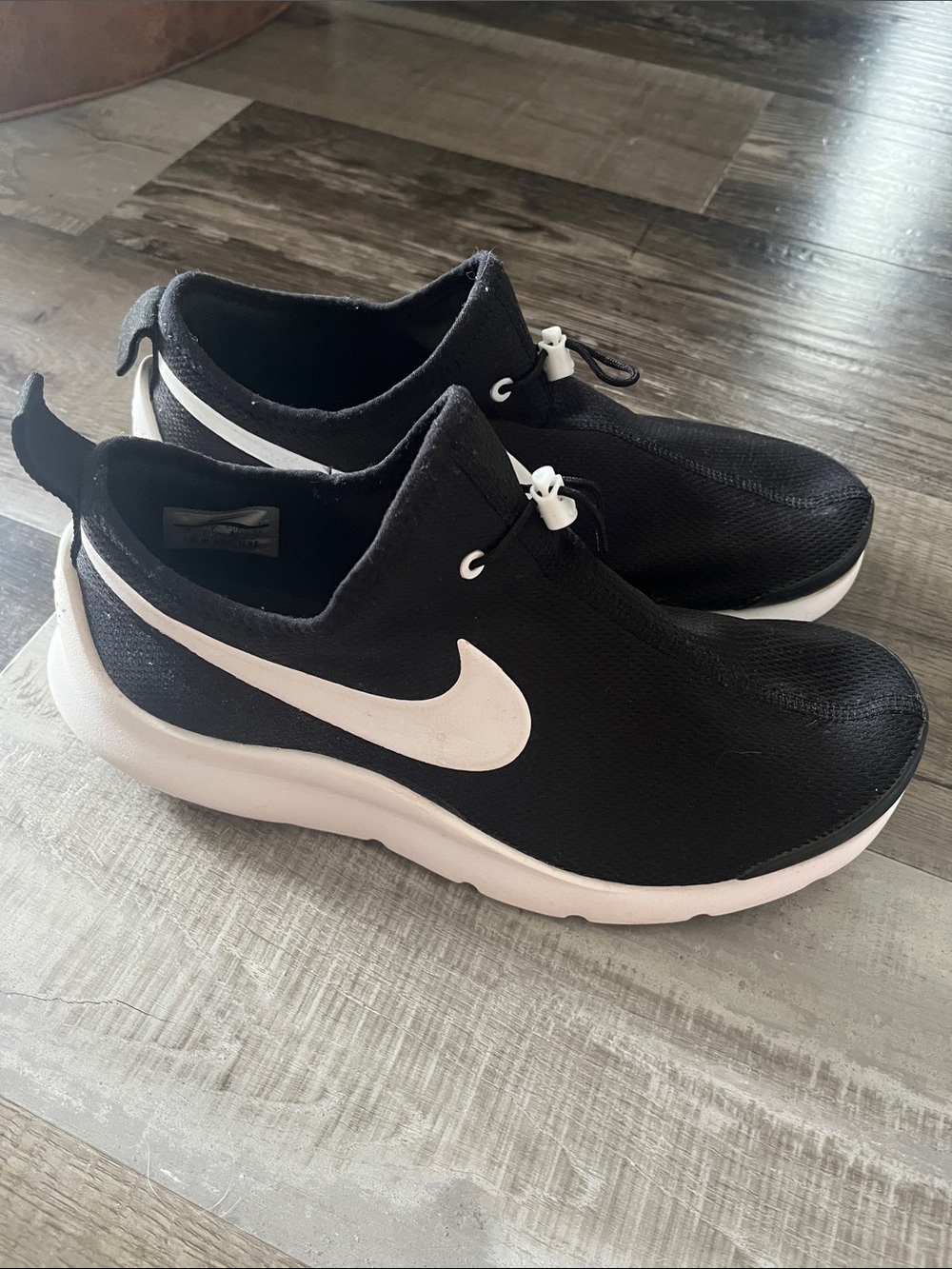 Nike Black and White Slip-On Athletic Sneakers
